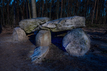 Wall Mural - Prehistoric megalith dolmen Teufelskueche (devils kitchen) at night