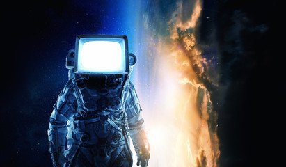 Wall Mural - astronaut with tv head in space. mixed media.