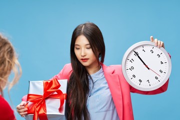 young woman with clock