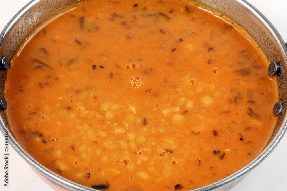 indian style dal lentil tarka spicy ghee fried dish in brass karai bowl pan top view - obrazy, fototapety, plakaty 