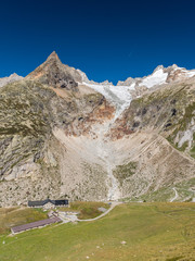 Wall Mural - The refuge Elena in val Ferret; the Prè de Bar glacier and the mount Dolent in the background (Aosta Valley, Italy)