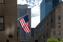 American Flag In Front Of Rockefeller Center