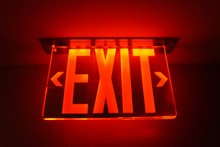 Close Up View Of Illuminated Exit Sign