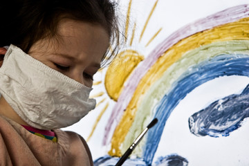 rainbow flashmob on glass close-up. children's drawing of a rainbow on a window pane during quaranti