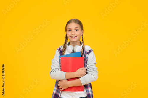 School lesson. Study literature. Towards knowledge. Learn following rules. Modern school student. Free courses. Welcome back to school. Motivate kids for academic year ahead. School girl hold books