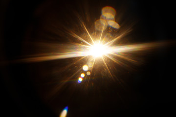 Aufkleber - Easy to add lens flare effects for overlay designs or screen blending mode to make high-quality images. Abstract sun burst, digital flare, iridescent glare over black background.