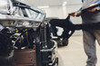 auto mechanic repair car body bumper replacement.