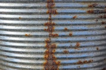 Wall Mural - gray metal texture from an old dirty striped wall with brown rust spots