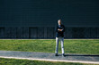 © Westend61 - Portrait of confident gray-haired businessman standing at a building in the city