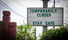 "Temporarily Closed, Stay Safe" Sign