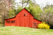 old red barn in the field