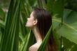 © SHOTPRIME STUDIO - Beautiful woman green leaves charm swimsuit sun tropics