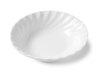 White plate placed on a white background