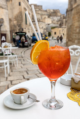  A refreshing aperol spritz in one of the cafes in Sassi di Matera, the historic district of Matera, Basilicata. Italy