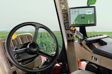 Autocollant - Autonomous tractor working on the field. Smart farming