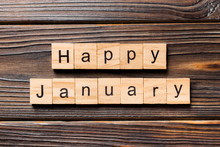 Happy January Word Written On Wood Block. Happy January Text On Table, Concept