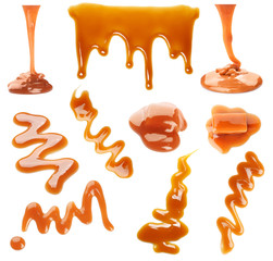 Wall Mural - Set with caramel candies and tasty sauce on white background