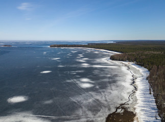 Wall Mural - Aerial view on the Onega lake covered with ice, northwest of Russia