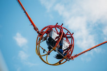 People Having Fun On A Reversed Bungee, Also Called Slingshot Ride.
