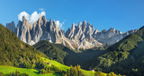 Fototapeta Góry - Famous alpine place  Santa Maddalena village with magical Dolomites mountains in background, Val di Funes valley, Trentino Alto Adige region, Italy