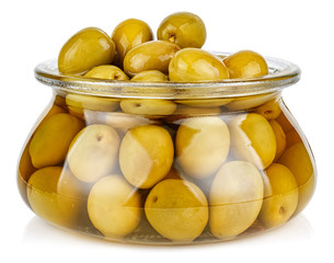 Whole green olives in brine in a open transparent glass oval storage jar isolated on white background