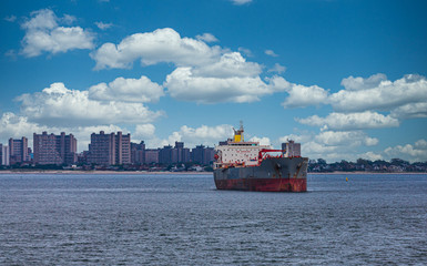 Poster - An old rusty tanker sailing off the coast