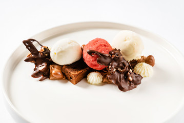 Wall Mural - brownie with ice cream on the white plate