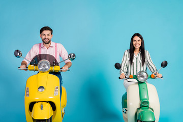 Sticker - Positive cheerful two lovely bikers man woman drive their motor bike wear striped shirt pink isolated over blue color background