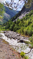 Mountain river and lots of rocks. In the far term, high mountains.