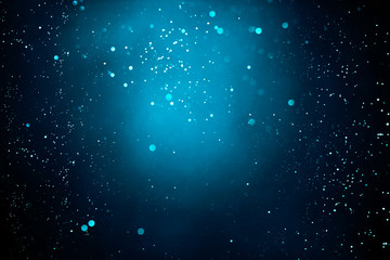 Wall Mural - abstract dark background with glowing turquoise particles.