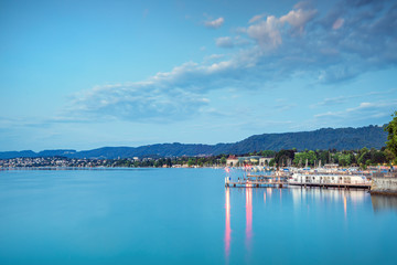 Wall Mural - Scenic view of historic Zurich city center with famous Fraumunster and Grossmunster Churches and river Limmat at Lake Zurich, Zurich, Switzerland
