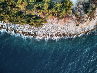 Sticker - Top drone shot of blue ocean water in turkey. aerial evening mood of the coast beach. waves of turkise white water.