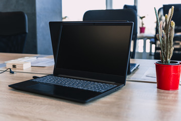  laptop on the desktop with office supplies. new workplace concept