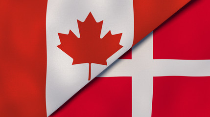 The flags of Canada and Denmark. News, reportage, business background. 3d illustration