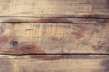 Wall Mural - Vintage brown wood background - Old weathered wooden plank painted in brown/yellow color. Background of three boards. 