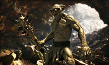 Portrait Of An Evil Troll With A Spiked Club Wandering Through A Large Natural Cave.3d Rendering