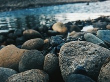 Close-up Of Rocks At Riverbank