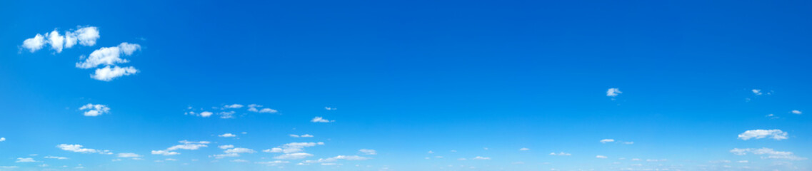 Poster - Blue Sky background with tiny Clouds. Panorama background