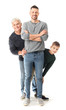 Man with his father and son on white background