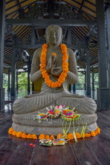 Beautiful flower decoration on statue, Bali