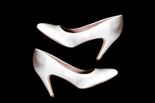 White Women Shoes On A Black Background