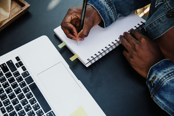 Man writing notes