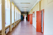 An empty school corridor stretching into the future. The concept of holidays, quarantine, evacuation