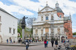 St. Peter and Paul Church with statues of saints on the Grodka Street in the Old Town of Krakow. A memorial of Jesuit priest Piotr Skargaon the St. Mary Magdalene Square.
