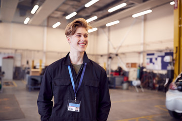 Portrait Of Male Student Studying For Auto Mechanic Apprenticeship At College