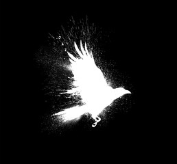 white silhouette of a flying raven with spread wings with paint splashes, splatters and blots isolat