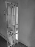 Fototapeta Londyn - Jail cell door