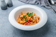 © Алиса Королевская - Pasta Penne arabiata on grey table