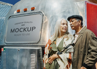 Wall Mural - Senior couple standing by the food truck