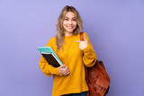 Fototapeta  - Teenager Russian student girl isolated on purple background with surprise facial expression